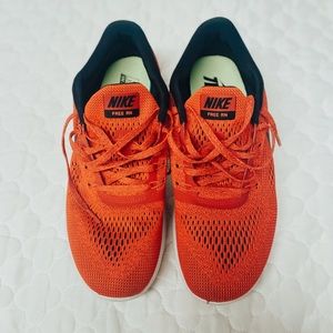 Nike red free run sneakers